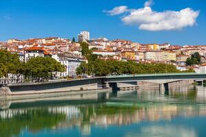 Cityscape of Lyon, France with reflections in the water photo