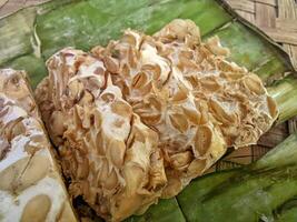 Tempe or tempeh is a typical Indonesian food made from fermented soybeans in addition to yeast or tempeh yeast. photo