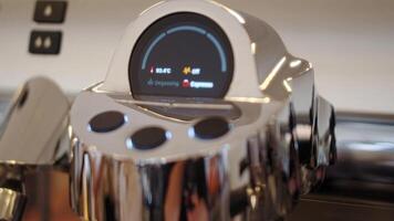 indicators on the panel of the coffee machine, close up video