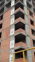 Multi-Story Brick Building with Visible Floor Numbers video