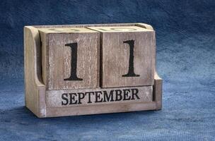September 11 date in a rustic wood block calendar photo