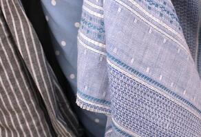 Light Pale Colored Cotton Patterned Fabrics on Display photo