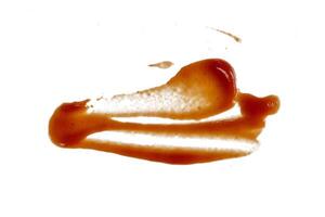 stroke of soy sauce splashing isolated photo