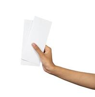Hand holding blank flight ticket for mockup photo