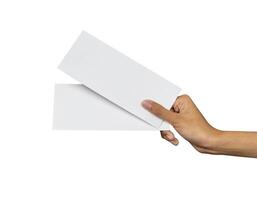 Hand holding blank flight ticket for mockup photo