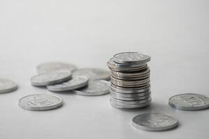 chaos coin stack on table photo