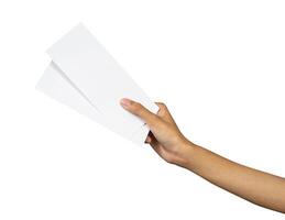 Hand holding blank flight ticket for mockup photo