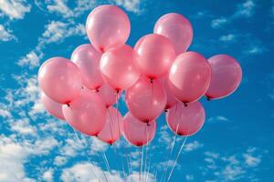 rosado globos flotador en contra un brillante azul cielo con mullido blanco nubes en un alegre al aire libre ajuste foto