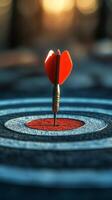 Dart with heart-shaped tip hitting the center of target in a serene blue water background photo