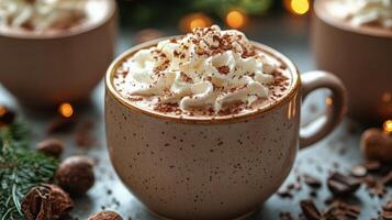 Warm cup of chocolate beverage topped with whipped cream and chocolate shavings at a cozy gathering photo