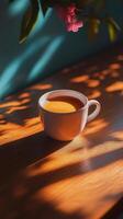 Warm coffee in a cozy setting by the window during a quiet morning photo