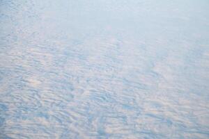 Top view of clouds, view from airplane, natural white background photo