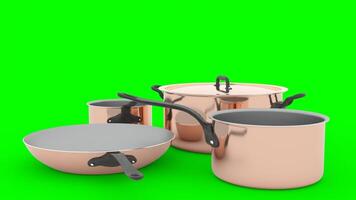 copper pots and pans with green background photo