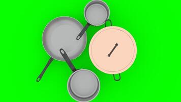 copper pots and pans with green background photo