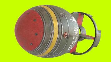 mini nuclear bomb with green background photo