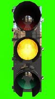 traffic signal light with green background photo