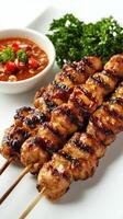 Grilled Chicken Skewers with Spicy Sauce and Parsley photo