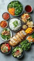 A Variety of Vietnamese Dishes Arranged on a Grey Surface photo