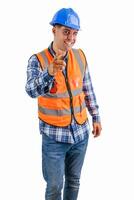 vertical Satisfied construction worker pointing at the camera with a wink wearing orange vest photo