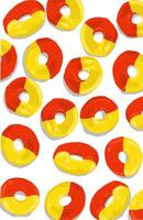 a pattern of red and yellow gummy chewy candys on white background vector