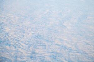 Top view of clouds, view from airplane, natural white background photo