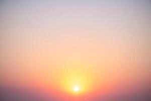Natural delicate background, sky at sunrise, color gradient from yellow to orange, delicate and smooth transition photo
