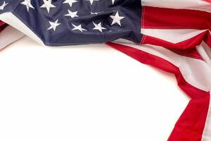 Top view of the American flag on a white background with copy space for text photo