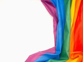 The rainbow flag or LGBT is on a white background with copy space for text photo