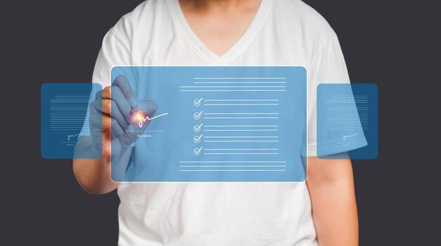 de cerca de mano utilizando un bolígrafo a firmar documentos en un virtual pantalla mientras en pie en un gris antecedentes foto