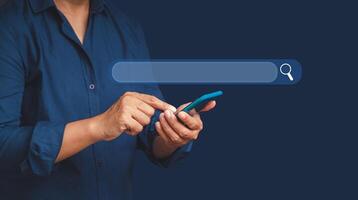 Close-up of hands businessman using a smartphone to search for information on the internet photo