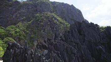 black cliffs in Lagoon on the islands, Palawan Philippines. Drone view video