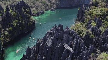 a big lagoon in El Nido Drone flies around cliffs video