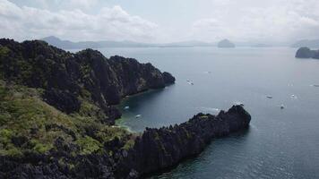 Cliffs stretching into the sea on tropical islands video
