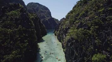 Drone flies over a big lagoon in El Nido video