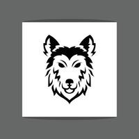 A black and white illustration of a wolf's head with pointed ears and a friendly expression vector