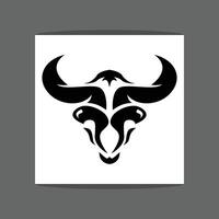 A black and white image of a stylized bull or buffalo head silhouette vector