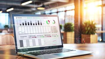 Laptop showing trading platform with graphs and exchange rate in modern office video