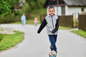 Children playing together in a park or engaging in a game. photo