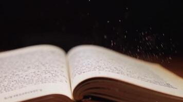 Dramatic Close-Up of a Book Snapping Shut with Floating Dust Particles video