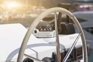 Sailing yacht control wheel and implement. photo