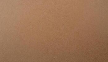close-up of natural brown kraft paper texture with subtle speckled details and eco-friendly aesthetic for packaging and design photo