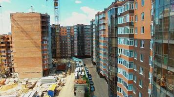 Construction site of a multi-storey building. New architecture builds in the modern residential complex of a city. video
