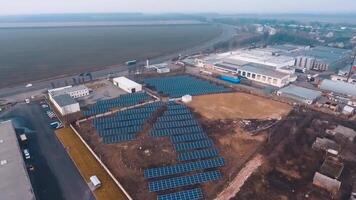 Solar cell panels field. View from above on the sunny batteries in the countryside. Renewable alternative green energy concept. Future technology. Aerial view. video