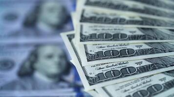 Edges of one hundred dollar bills rotating. American money background. Rotation of dollar banknotes. Close-up. video
