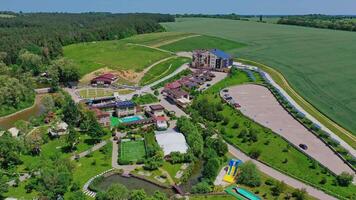 Modern complex for rest. Recreation area on beautiful nature background. Panoramic view of outdoor park to relax for summer vacation. Aerial view. video