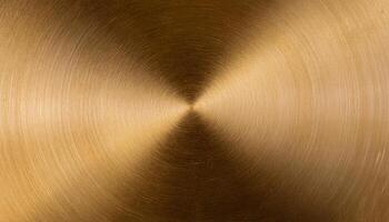 macro view of a polished brass plate with concentric circular brushed texture and rich golden metallic tones photo