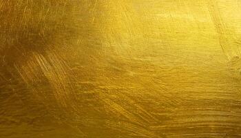 close-up of smooth gold leaf surface with delicate brushed texture and luminous metallic sheen for luxury design backgrounds photo