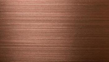 macro view of brushed bronze sheet with horizontal grain and smooth metallic texture photo