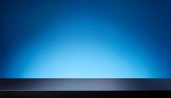 minimalist black table with sleek matte surface against a vibrant gradient blue background, perfect for modern tech product displays and professional presentations photo