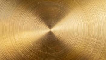macro view of clean brass plate with concentric circular brushed texture and golden metallic finish photo